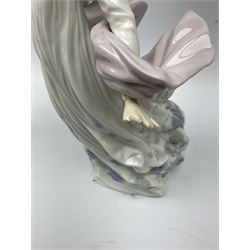 Large Lladro Figures, Spring Splendor, designed by Regino Torrijos, model number 5898, H30.5cm, the glass slipper, designed by Jose Puche, model number 5957, H29cm and Breathless, designed by Juan Ignacio Aliena, model number 6430, H31cm.