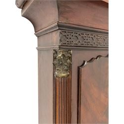W. Phillips of Bromyard - 8-day mahogany longcase with a painted moon roller dial, c 1790,
swans neck pediment with dog tooth moulding, raised carving and  brass paterie, break arch hood door beneath flanked by reeded pilasters with brass Corinthian capitals, trunk with a blind fret, reeded quarter columns and long wavy topped door,
Plinth with a deep moulding and canted corners raised on a shaped base, painted dial with gesso spandrels, Roman numerals, five minute Arabic's and minute dots, with steel hands, seconds dial and square date aperture, dial pinned to a rack striking movement with an anchor escapement, striking the hours on a cast bell. A clockmaker by the name of John Phillips is recorded as working in Bromyard (Worcs)  in the early to mid 18th century, certainly by 1770-90. W. Phillips was possibly an unrecorded son or brother also working in the same family clockmaking business during the later part of the 18th century.
