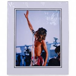 Signed bottle of Rod Stewart edition Wolfie's blended scotch whisky, together with Rod Stewart memorabilia, including first edition of his autobiography, colour photograph and two 7 inch singles