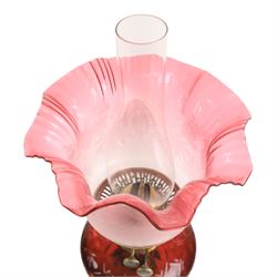 Victorian oil lamp, with etched shade with fluted rim, above a cranberry reservoir, on twisted brass pedestal and decorative base, together with cranberry glass jar, lamp H72cm 