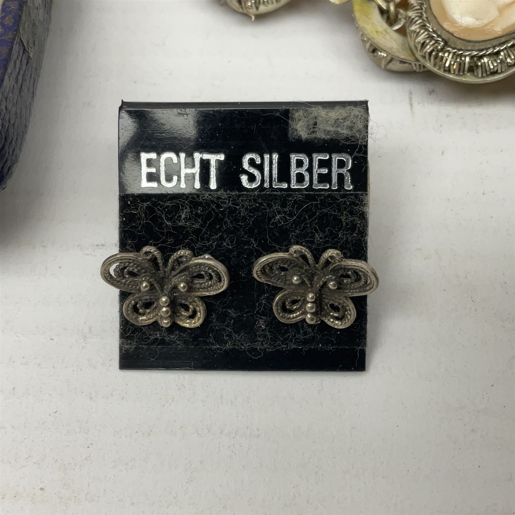 Set of six silver plated cocktail sticks, with acorn finials, hallmarked silver christening cup, silver ring and earrings and a costume jewellery cameo bracelet 