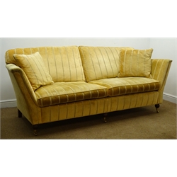  Duresta Ruskin style Grande sofa upholstered in pale gold fabric, turned supports on castors, W225cm  