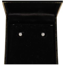 Pair of sliver diamond stud earrings, boxed