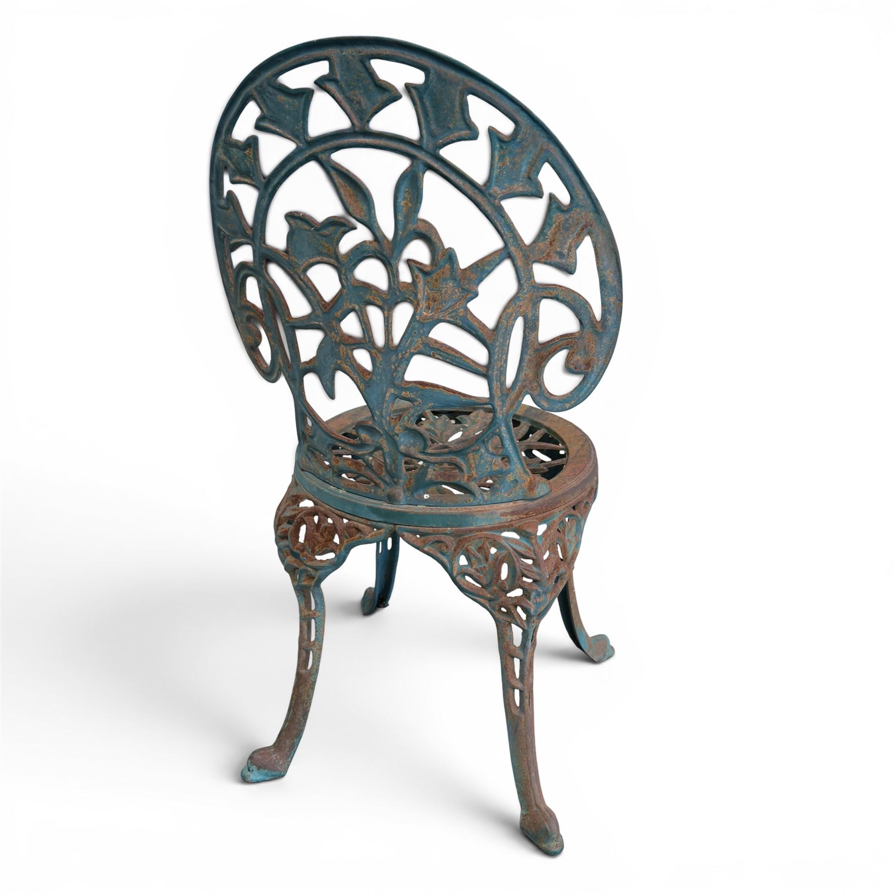 Cast iron garden table and four chairs, in the Art Nouveau style, with pierced floral and foliate decoration throughout, circular table raised on four cabriole legs with stretcher ring, chairs with shaped openwork backs and seats, in a weathered green finish