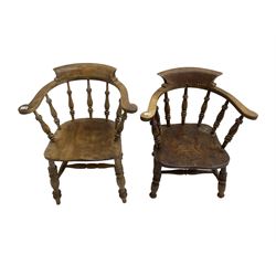 19th century elm and ash Captains smokers bow chair, spindle tub shaped back and saddle seat, raised on turned supports united by double H stretcher, together with a later oak similar chair