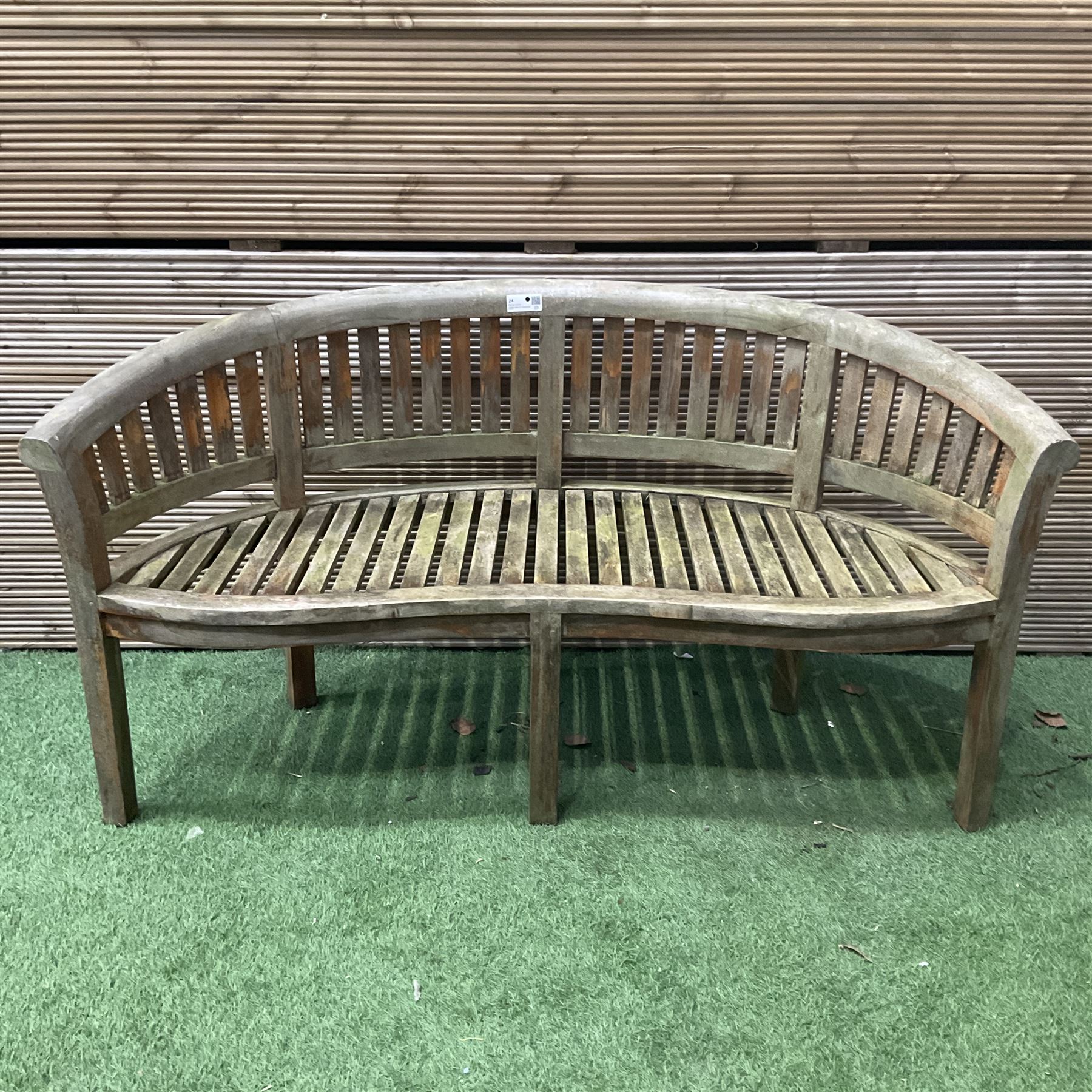 Teak serpentine curved garden bench - THIS LOT IS TO BE COLLECTED BY APPOINTMENT FROM DUGGLEBY STORAGE, GREAT HILL, EASTFIELD, SCARBOROUGH, YO11 3TX