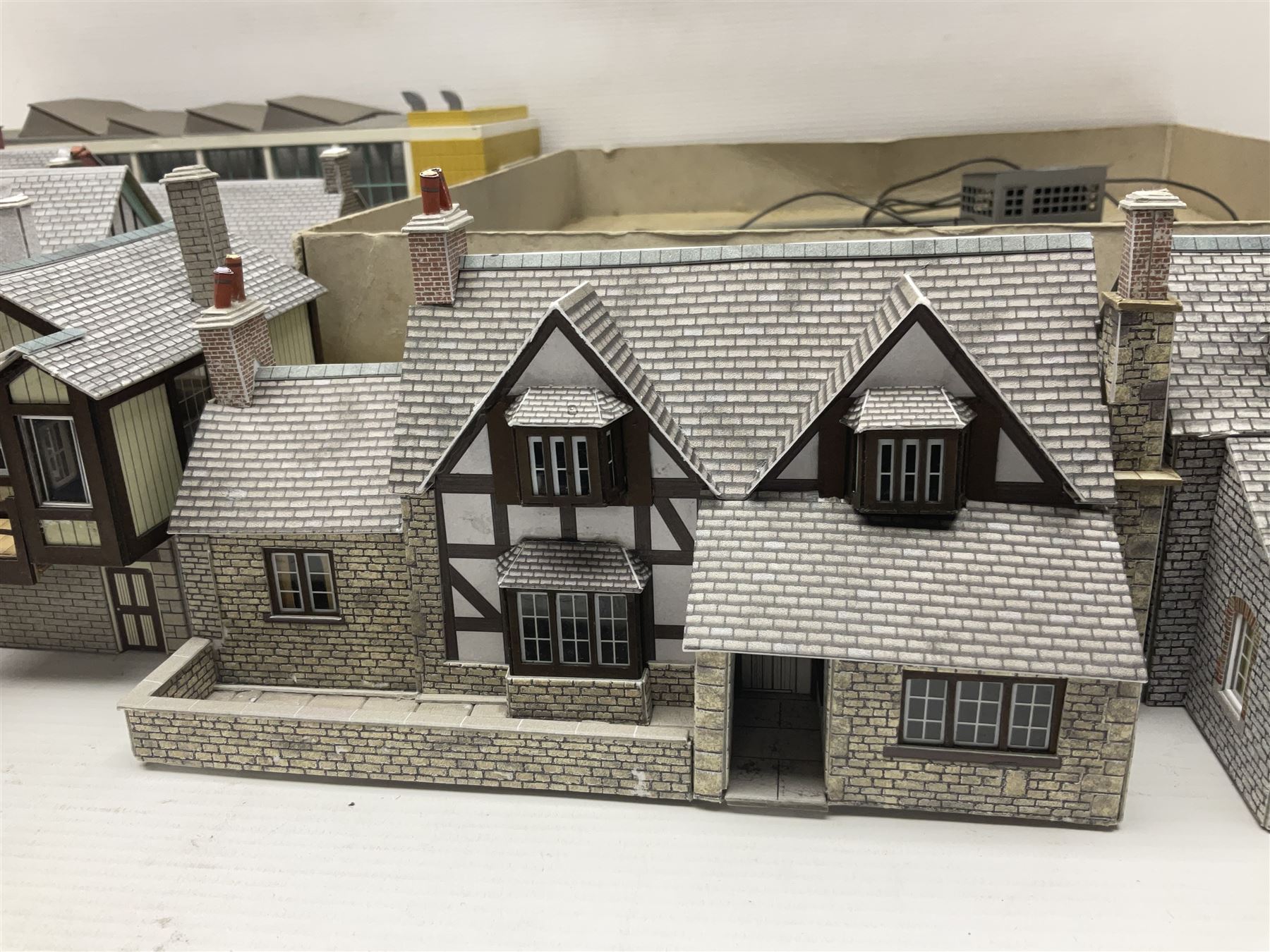 Fleischmann '00' gauge motorised turntable; boxed; kit-built plastic two-road engine shed; and eight kit-built card trackside/layout buildings