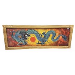 Framed fabric panel printed with a dragon chasing flaming pearl