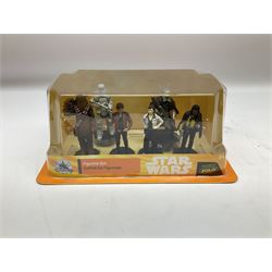 Star Wars - Disney Store The Force Awakens figurine playset, Poe's X-Wing Fighter, Snowspeeder and First Order Tie Fighter; Solo figurine set; The Last Jedi Elite Series die-cast action figure of Praetorian Guard; all mint and boxed; together with Star Wars Episode 1 card game, boxed (7)