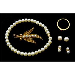 Two pairs of gold pearl stud earrings, gold pearl leaf brooch, gold pink stone set ring, all 9ct hallmarked or tested and a pearl bracelet