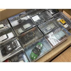 Fabbri James Bond Collection - over one hundred and ten die-cast models in perspex display cases as issued periodically; and a quantity of associated magazines and trading cards, in five boxes
