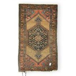 Old Turkish rug, possibly Anatolian, the indigo ground pole medallion decorated with stylised floral motifs, enclosed by spandrels with stylised flower heads, repeating border with guard stripes 