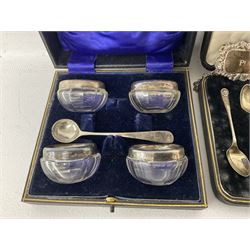Cased set of six spoons by Cooper Brothers & Sons, two hallmarked silver decanter labels, four silver collared glass salts in box, further silver spoon and napkin ring
