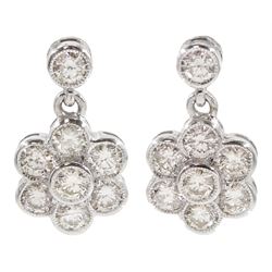Pair of 18ct white gold milgrain set round brilliant cut diamond daisy cluster stud earrings, total diamond weight approx 1.30 carat