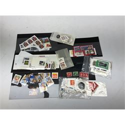 Stamps including Great British first day covers many with special postmarks, Queen Victoria penny red stamps, small number of mostly topographical postcards, Channel Island stamps, Ireland, Germany, Greece etc, in one box