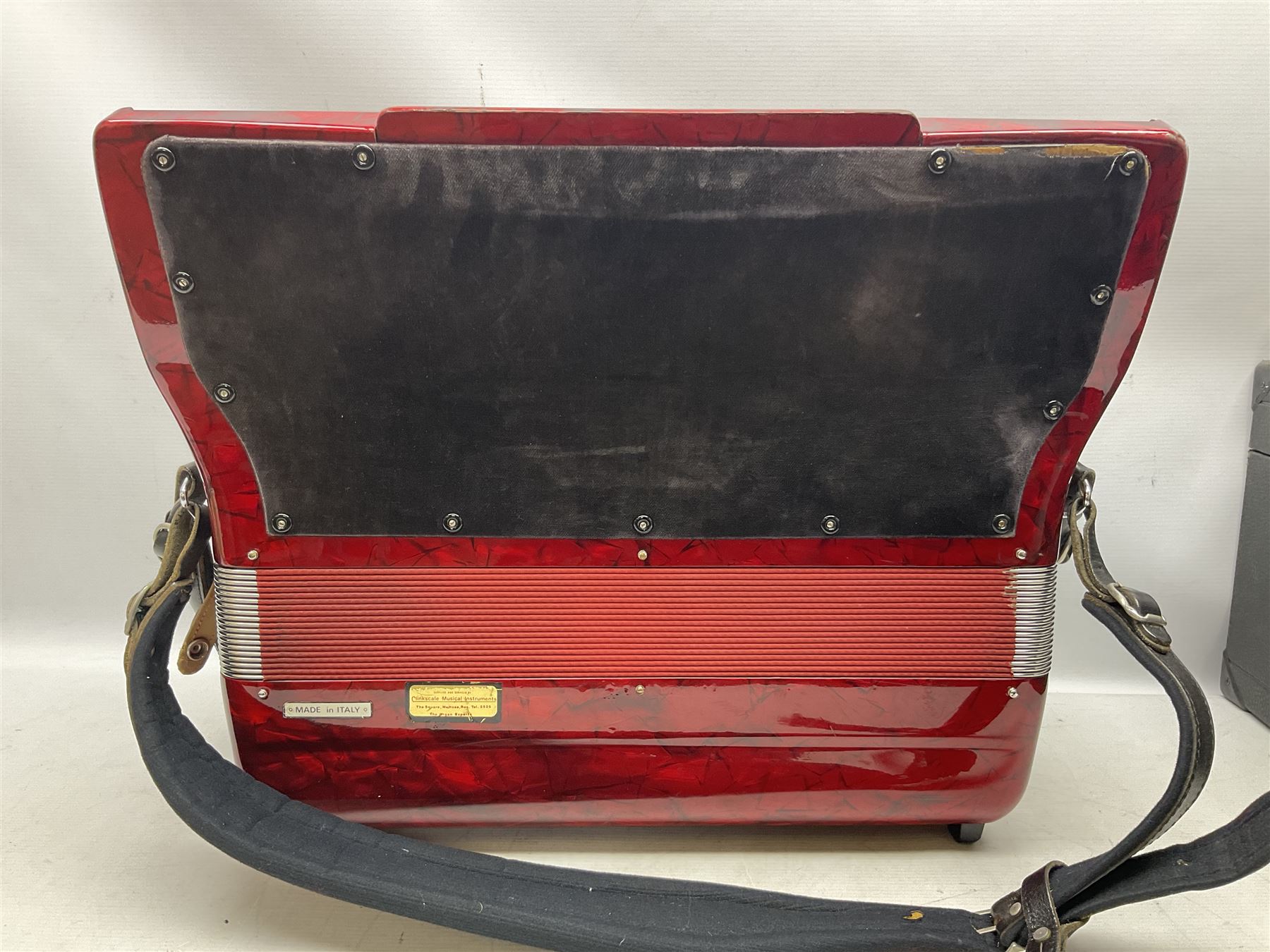 Clinkscale Crucianelli piano accordion in red pearline case with one-hundred and twenty buttons and forty-one keys L52cm; in carrying case