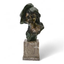 Bronze bust of a boy wearing a hat, upon a stepped marble base, H37cm