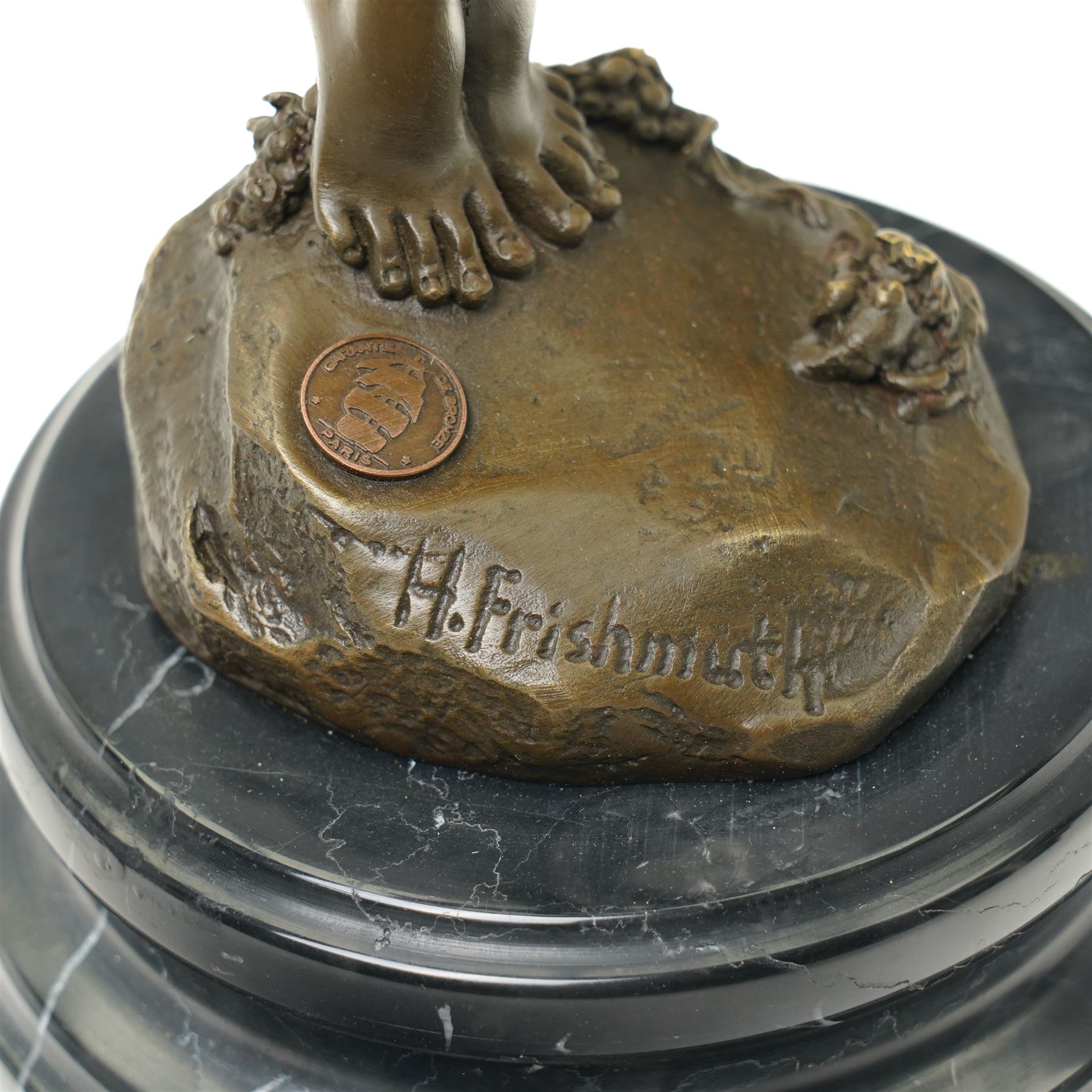 Bronze figure of a nude female holding a vine, after 'H. Frishmuth', with foundry mark on socle base, H38cm