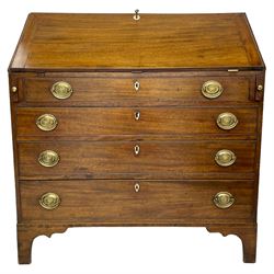  George III mahogany bureau, the fall-front banded and with boxwood stringing, enclosing fitted interior with pigeonholes and drawers surrounding a central cupboard with inlaid shell motif, the base with four graduating cock-beaded drawers, each with pressed brass handle plates with central lion masks and ivory escutcheons, on shaped bracket feet
This item has been registered for sale under Section 10 of the APHA Ivory Act