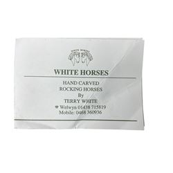 Terry White for White Horses (Hertfordshire 20th century) - Carved pine rocking horse, raised on a pine trestle base