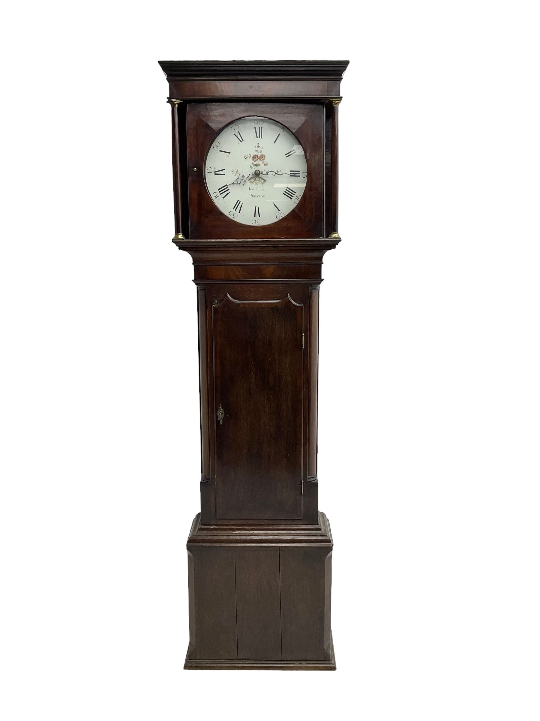 Henry Fisher of Preston (Lancs) -  late 18th century 30-hour oak and mahogany longcase clock c1790, with a flat topped pediment and moulded cornice, square hood door flanked by two plain pillars with brass capitals, trunk with recessed quarter columns, three-quarter length trunk door with an ogee twin spire top and crossbanding, rectangular plinth with canted corners and a narrow applied moulding to the base, circular 13” painted dial with Roman numerals, minute markers and five minute Arabic's, floral decoration to the centre and a semi-circular calendar aperture with date disc behind, original steel serpentine hands, dial inscribed “H Fisher, Preston”, dial pinned directly to a weight driven countwheel striking movement, striking the hours on a cast bell. With pendulum and weight.
Henry Fisher is recorded as working in Preston from 1742-95.
