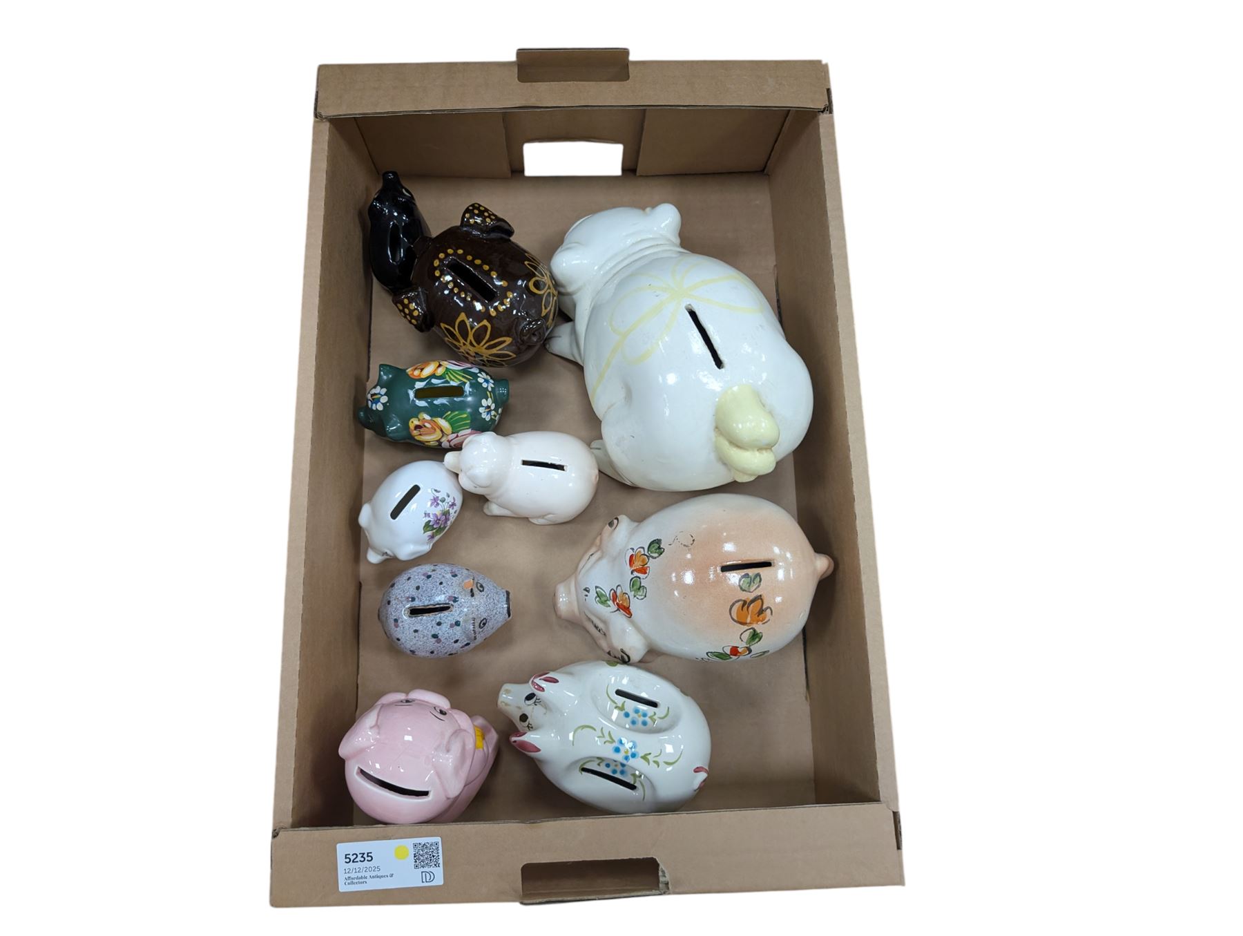 Collection of ten Vintage pottery piggy banks, to include treacle glaze example, H10.5cm, largest H18cm