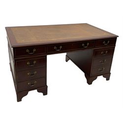 Reproduction mahogany twin pedestal desk, the moulded rectangular top fitted with inset leather, fitted with eight drawers, on bracket feet