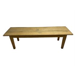 Early 20th century oak dining table, rectangular top raised on square tapering supports 