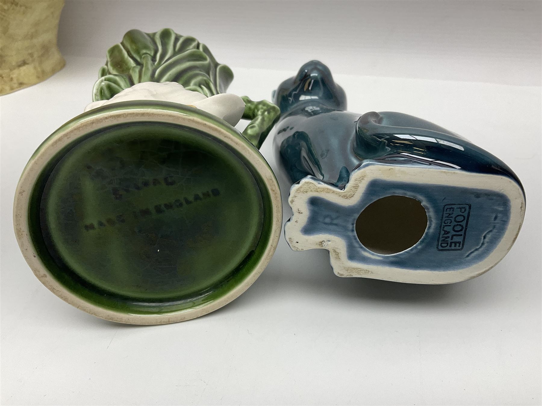 Sylvac budgieregar wall pocket, together with other Sylvac cermics including swan vases, blue tit vase and a frog figure etc, all with printed or impressed marks beneath, and a Poole Pottery cat figure, with printed mark beneath, wall pocket H22cm