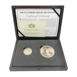 Canada 2015 'The Flanders Fields Silver Pair', comprising twenty dollars and fifty dollars fine silver proof coins, cased with certificate