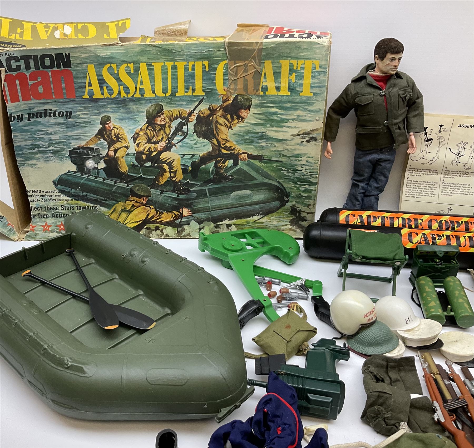 Action Man - one figure, boxed Assault Craft, dismantelled  Capture Copter, two bags of equipment and accessories etc