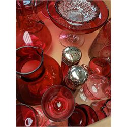 Collection of cranberry glassware, to include decanters, claret jugs, glasses, together with other glassware and ceramics