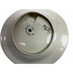 Lorna Bailey Old Ellgreave Pottery, comprising teapot in beach design, circular jar in house and path design, shell jug in Bridge and stream design, squat jug in Pagoda design and plate decorated with an Art Deco woman, all with printed and painted marks. 