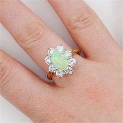 18ct gold opal and round brilliant cut diamond cluster ring, London 1976, opal approx 0.75 carat, total diamond weight approx 1.00 carat