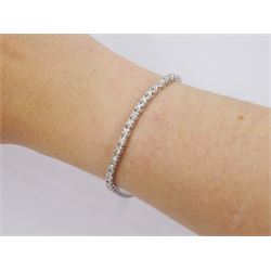18ct white gold round brilliant cut diamond line bracelet, stamped 750, total diamond weight approx 1.40 carat