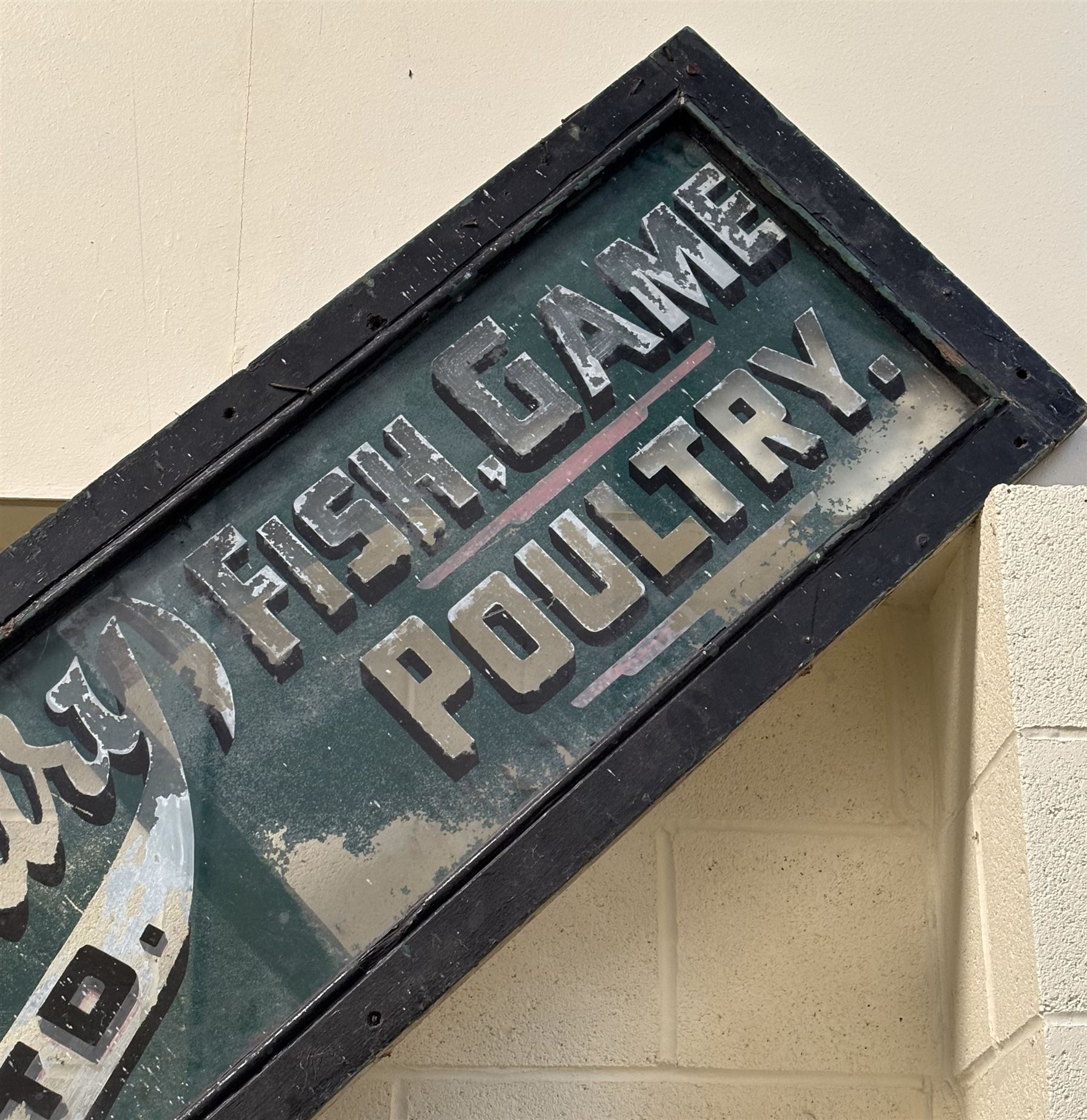Reverse painted glass shop advertising sign, late 19th century, reading 'George Ellis Dewsbury Ltd Fish, Poultry and game.' L407cm H51cm.  - COLLECTION BY APPOINTMENT FROM: The White House, Thirsk Road, Easingwold, York, YO61 3NF - CALL 01723 507111 TO ARRANGE