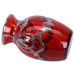 Early 20th century, ruby glass vase vase, with silver overlay of flower swags, impressed sterling H9cm, together with a similar wall vase H21cm,  