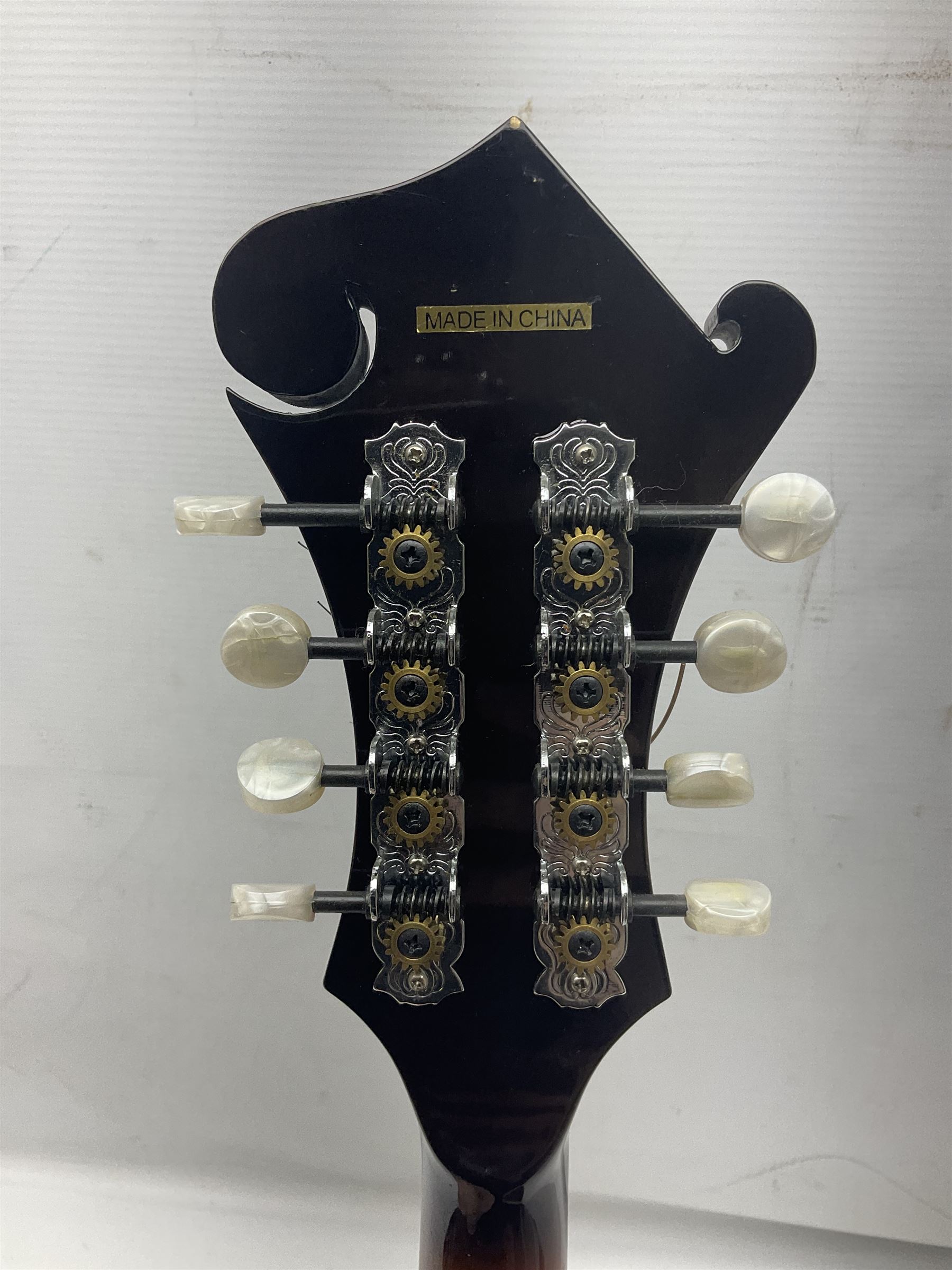 Ashbury F-Model eight-string mandolin, model no.IMF-150 with two-piece maple back and ribs and sunburst top, mother-of-pearl inlay; bears maker's label; L69cm