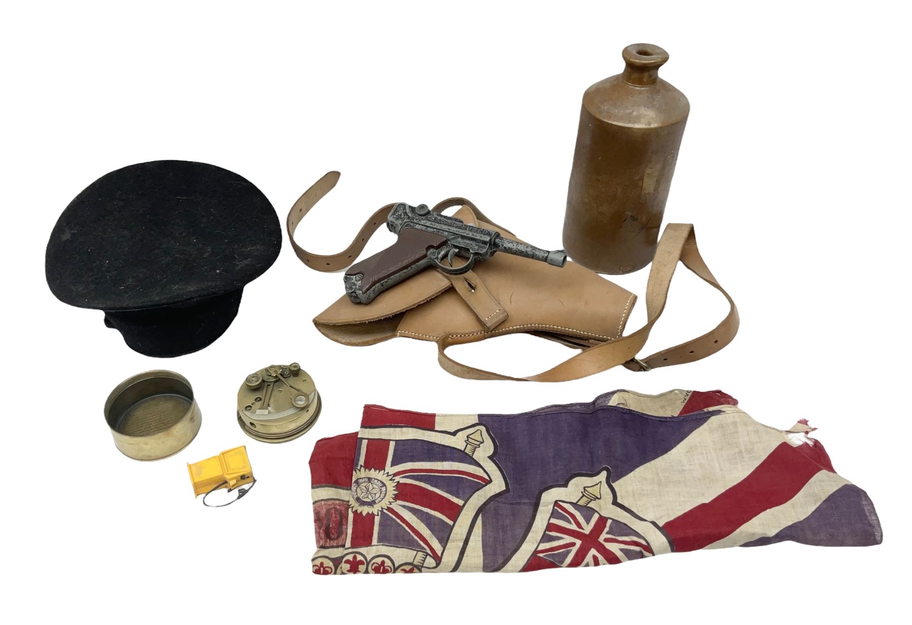 George VI 1937 Coronation flag, the central portrait and date covered with stitched panels 56 x 83cm; sailor's hat; leather holster with belt dated 1943 containing Lone Star toy die-cast Luger gun; and reproduction Stanley brass cased pocket sextant (4)