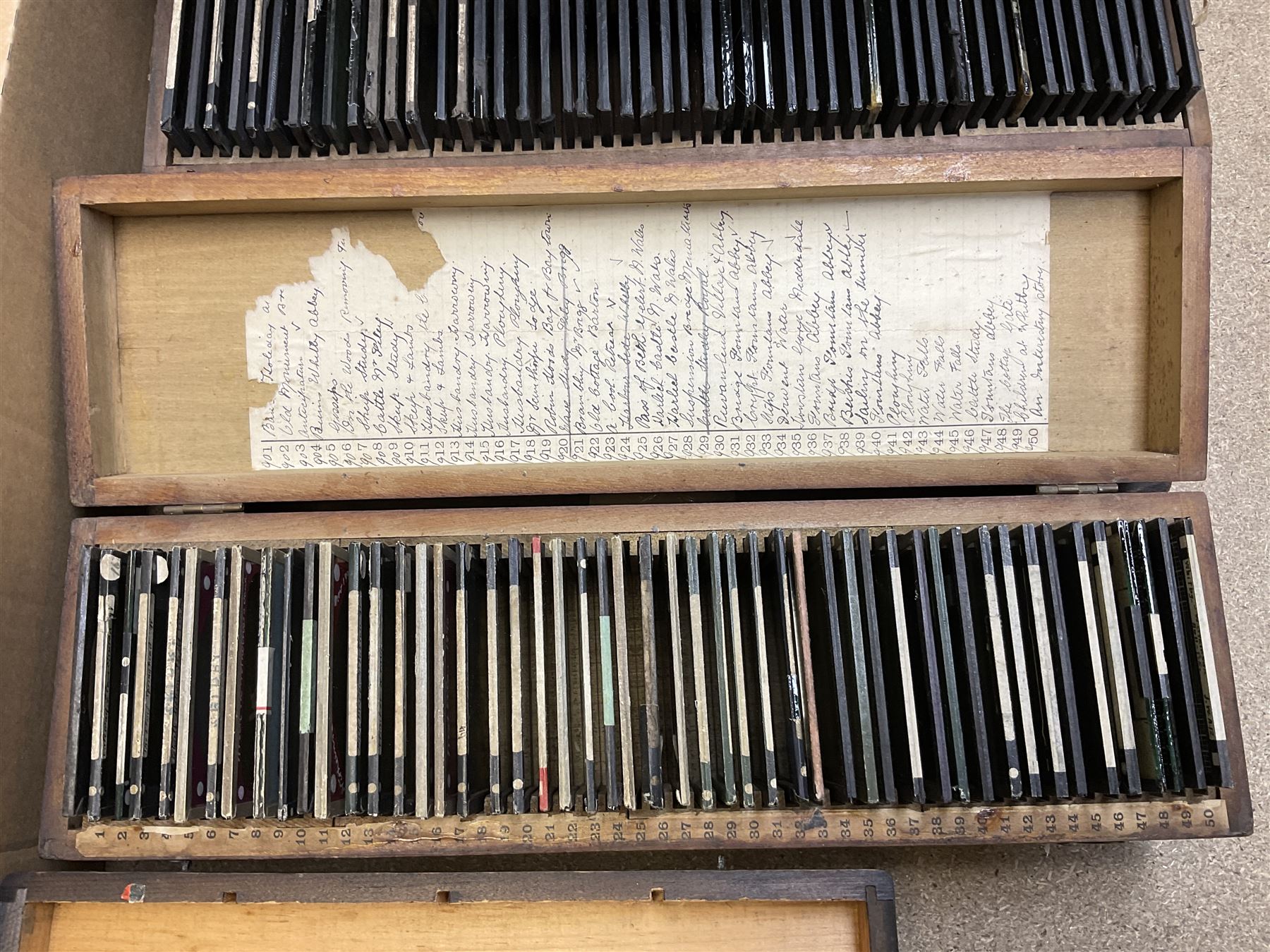 Large collection of over three hundred glass magic lantern slides including country, beach, town and street scenes, some with figures and animals