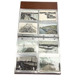 Edwardian and later postcards mostly relating to piers, housed in a ring binder album, approximately 160