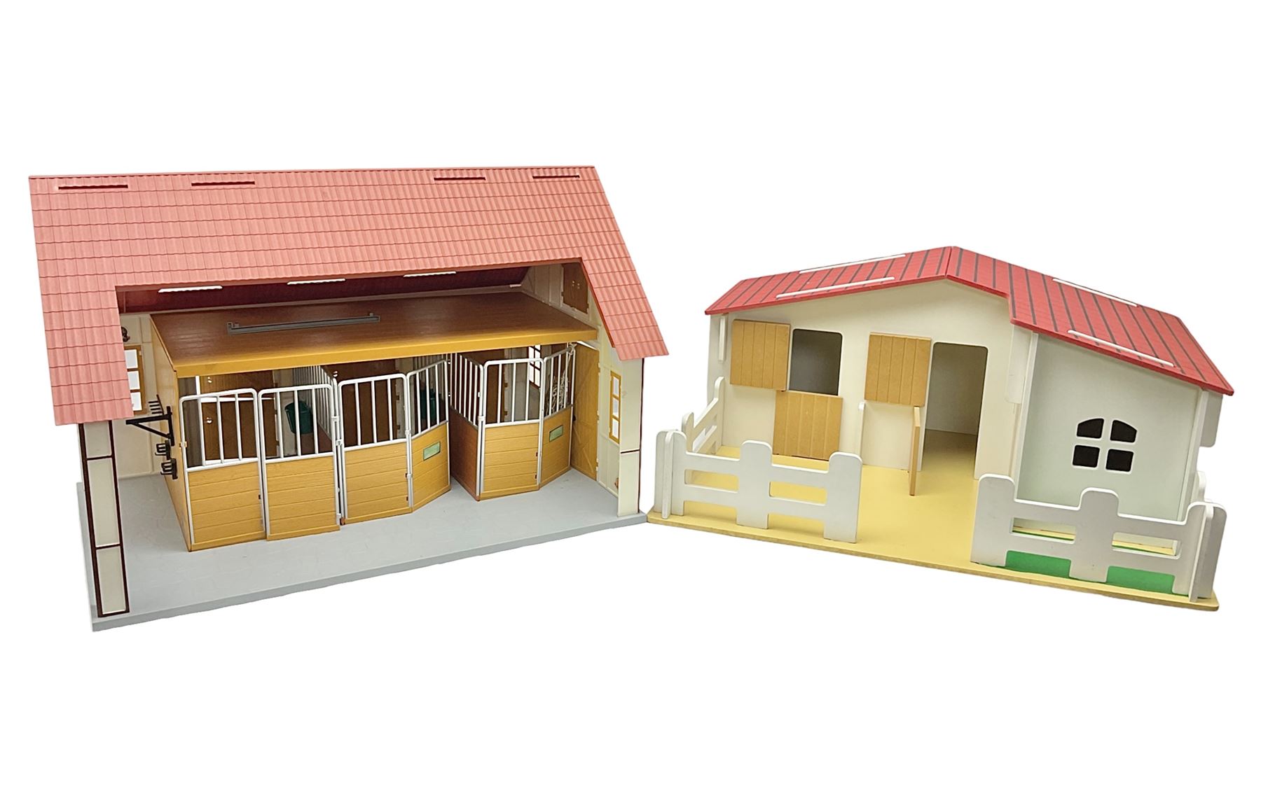 Sectional wooden horse stables playset by Julip with two stalls and tack room under a pitched roof, base 59 x 47cm; and another sectional plastic stables playset by Schleich with three stalls under an open pitched roof, base 56 x 36cm (2)
