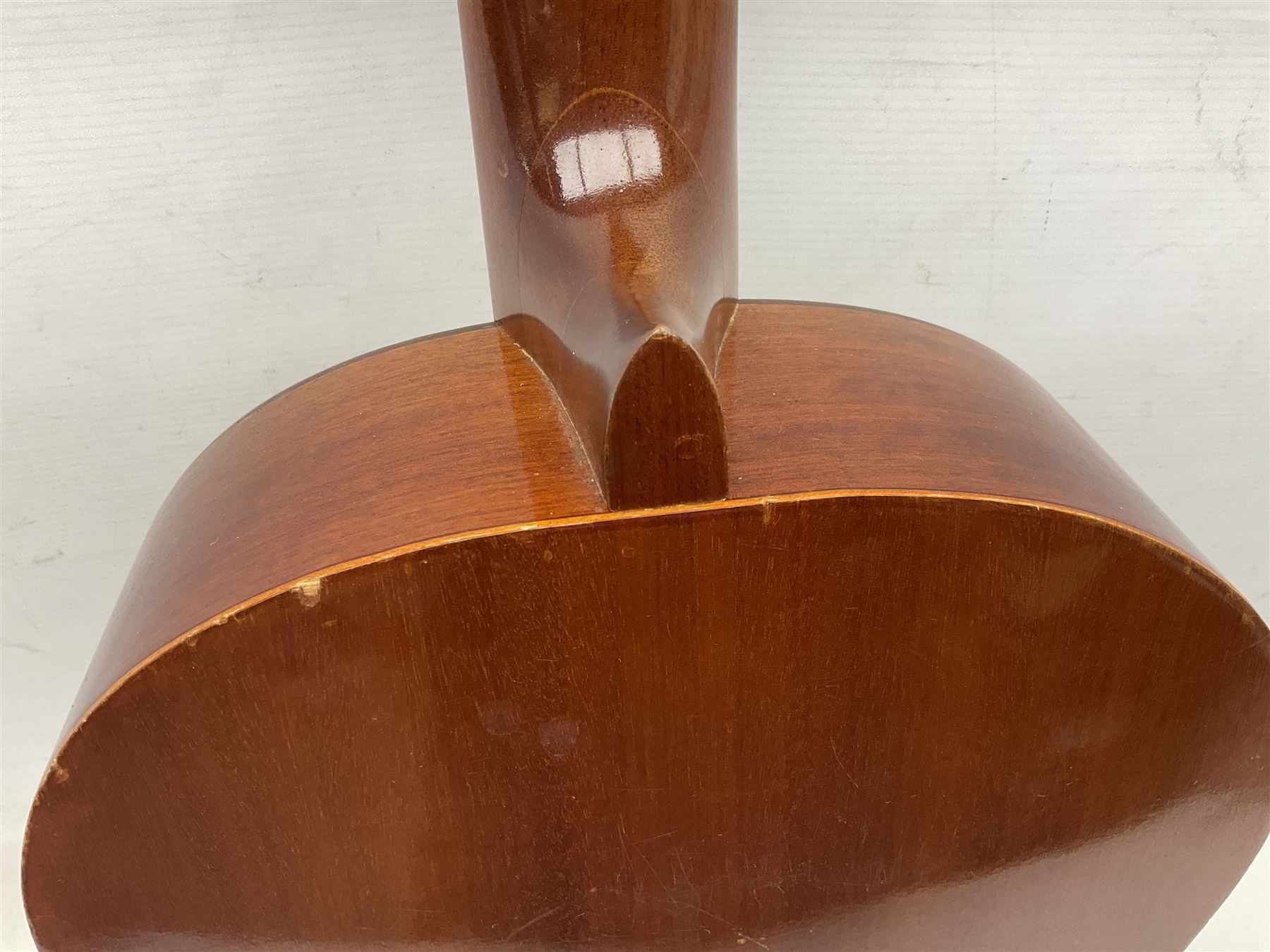 Spanish BM acoustic guitar with mahogany back and sides and spruce top L101cm; in cello carrying case; Roland foot pedal and two Yamaha foot pedals; tin D# organ pipe; folding music stand etc