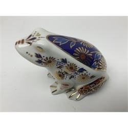 Three Royal Crown Derby paperweights, two examples modelled as ducks, one with gold stopper, the other with silver, an owl lacking stopper, and an Imari patterned frog lacking stopper (4)