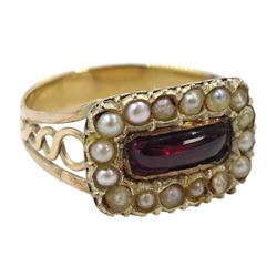 Victorian 9ct gold oval cut blue topaz brooch and a 9ct gold Victorian cabochon garnet and seed pearl ring