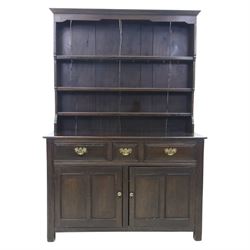 Georgian design oak dresser and rack, fitted with three drawers and two cupboards, complete with three tier plate rack