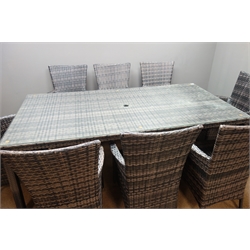  Rattan eight seater patio table, (W100cm, H75cm, L200cm), eight matching armchairs with cream cushions  