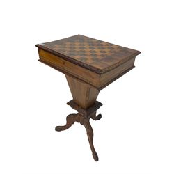 Victorian walnut work table, the rectangular hinged top inlaid with a chessboard design, canted edge with alternating ebony and satinwood inlays, concealing fitted interior, banded and strung frieze over tapering column well, collar carved with foliate decoration, on a cabriole tripod base
