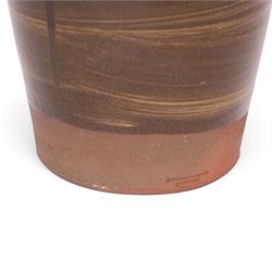 Studio pottery vase by Menston Art Pottery, decorated with brown and green slipware design, H39cm