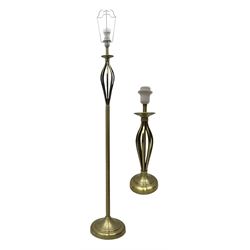 Contemporary brushed metal standard lamp, brass effect with cylindrical stem, on circular base, H131cm; matching table lamp, H35cm (2)